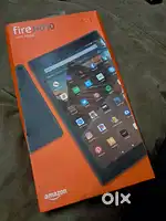 Amazon Fire HD 10 with Adapter and cable inside the box