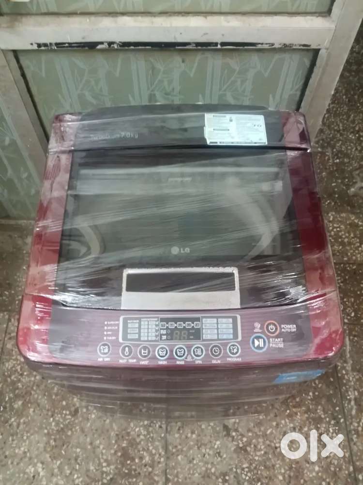 LG fuzzy logic top load 6.5 kg fully automatic washing machine