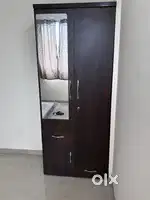Wooden wardrobe with mirror