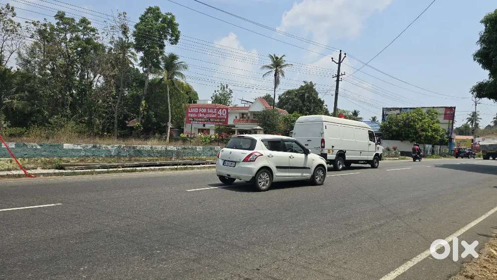 Angamaly M C road 40 cent commercial land for sale immediately