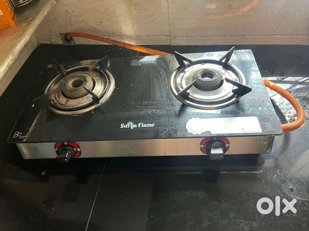 Gas stove with glass top