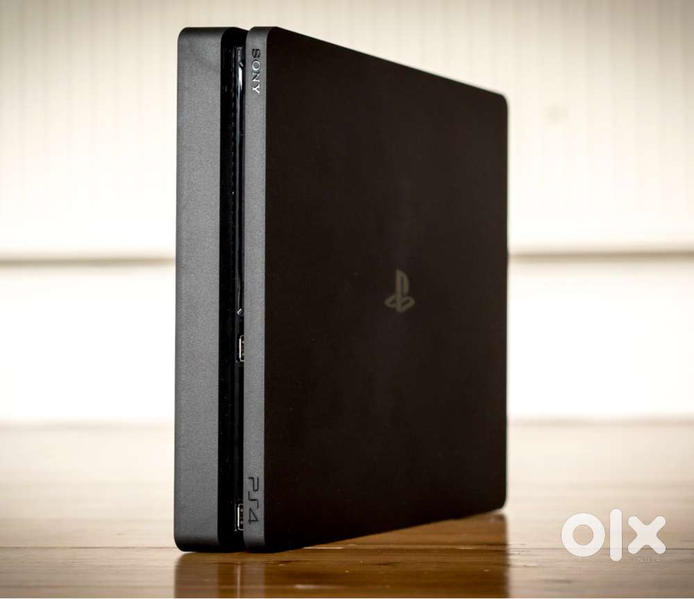 Sony PS4 (1TB) in Excellent Condition with Accessories – Gaming Ready!