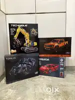 Lego batmobile tumbler, ford raptor, ferrari f40 & exacavator sets
