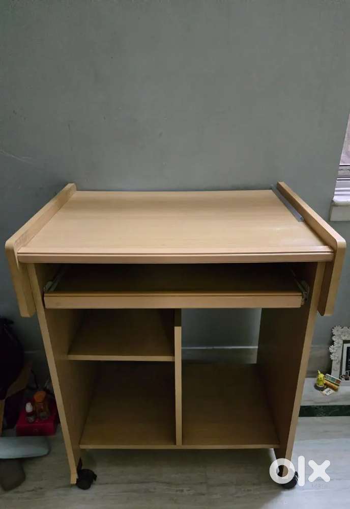 Wooden table with wheels for computer laptop or study purpose