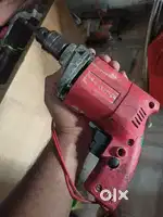 Drill machine reverse forward