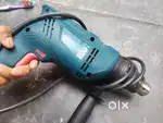Sell the Bosch drill machine ekdum new hai under warranty