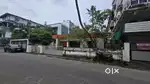 Panampally Nagar 6.25 cent commercialplot with house 40 lack per cent