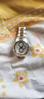 Titan wach original price  13000