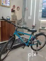 Rock Rider cycle from Btwin with extra side wheels and 6 months old