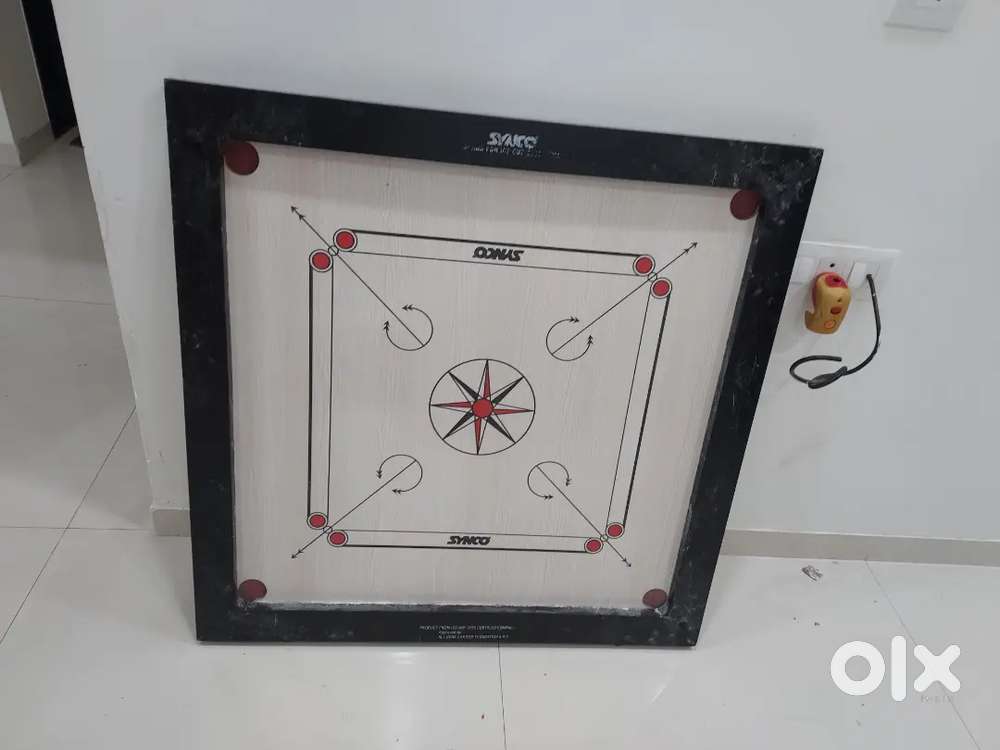 Synco carrom with synco coins and striker