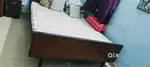 Queen size wooden bed