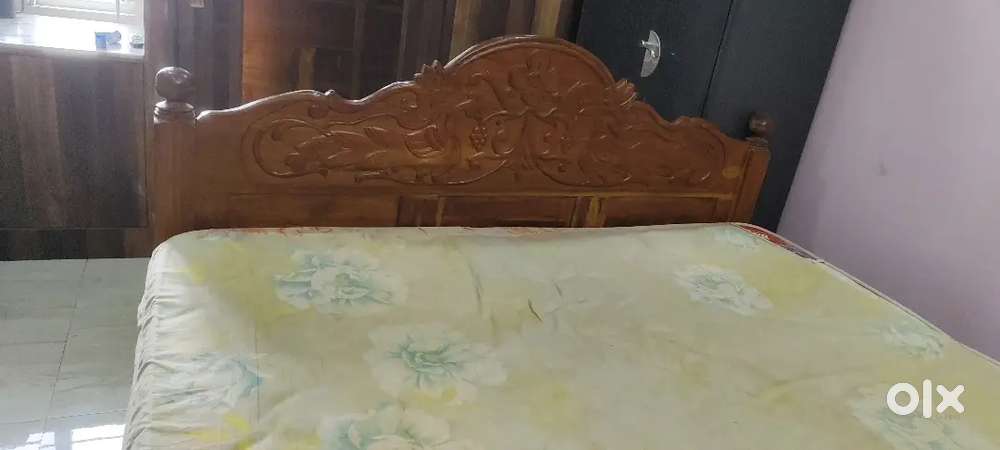 Teak wood cot with full design