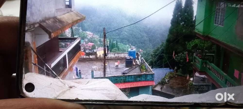 Facing road side on Gandhi road near actor govinda's house