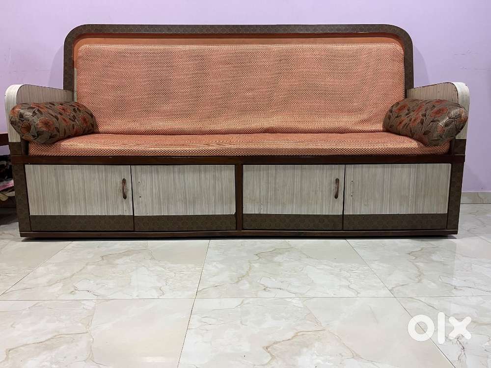 Sofa with bottom compartment