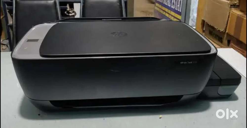 Hp ink tank 310 in good working condition with cables ready to use