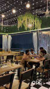 Heavy iron and wooden crafted chairs and tables