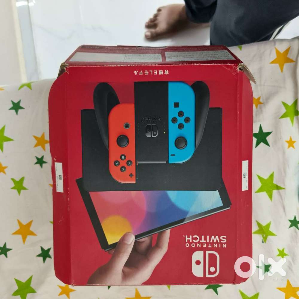 NINTENDO Switch OLED Console with Neon Blue Neon Red Joy Con 64 GB