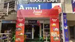 Running Amul outlet and restaurant