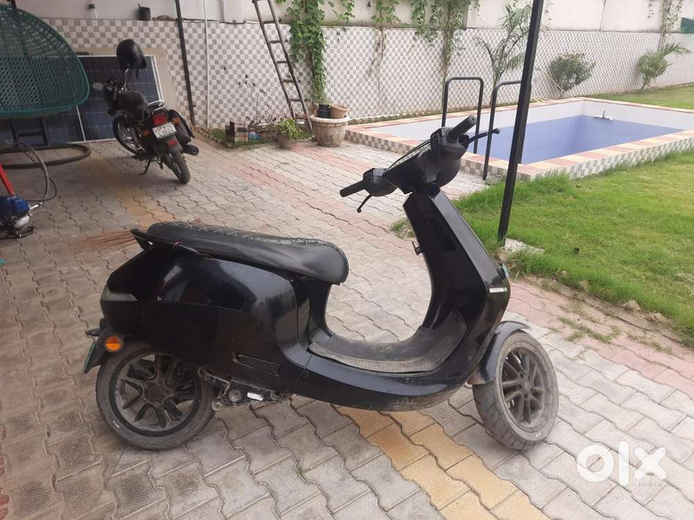 Well good condition ola scooty with charger