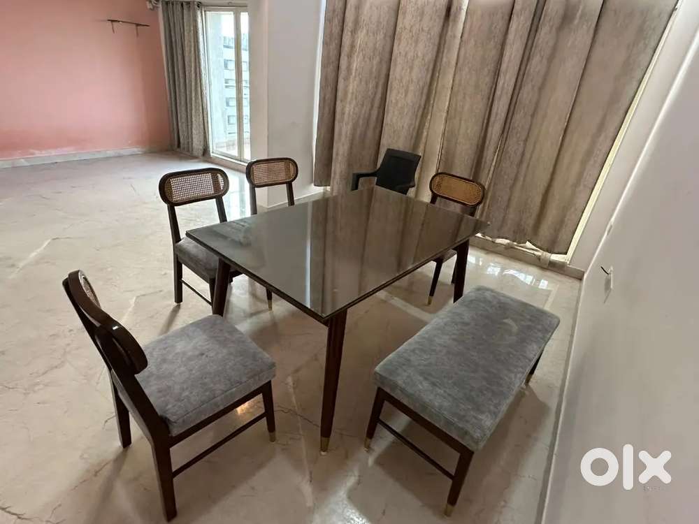6-seater dining table set with glass top