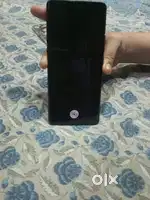 It is a blue colour phone and the cover will be included with it.