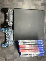 Ps4 slim 1tb + 8 games + 2 controllers