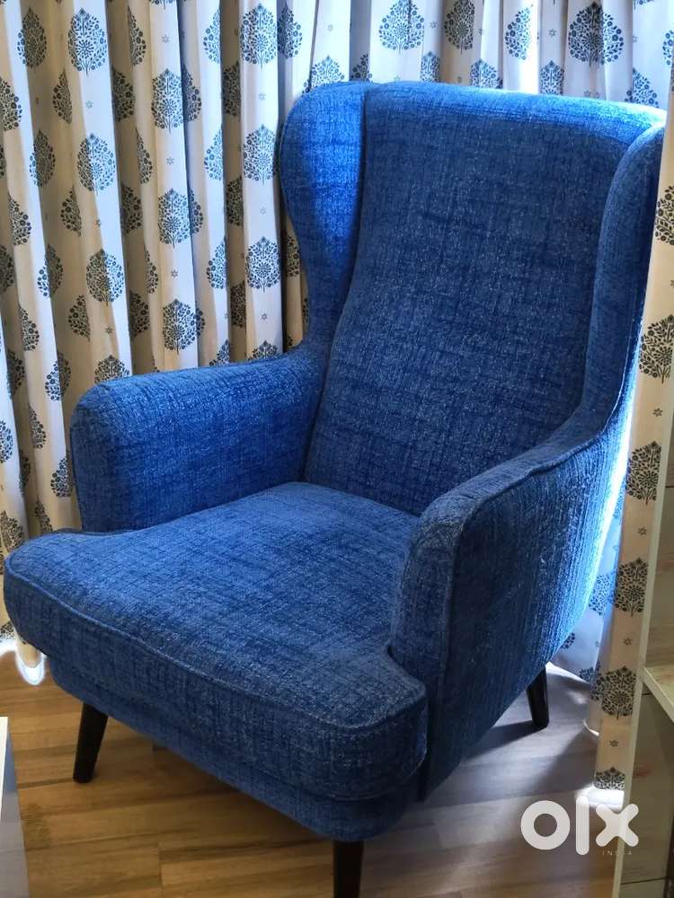 Urban ladder wing chair moderately used, recently chnaged upholstry