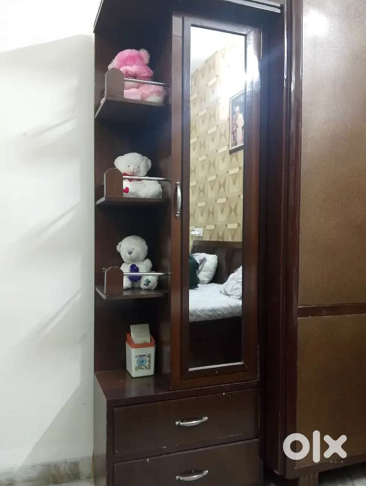 Dressing and storage cupboard