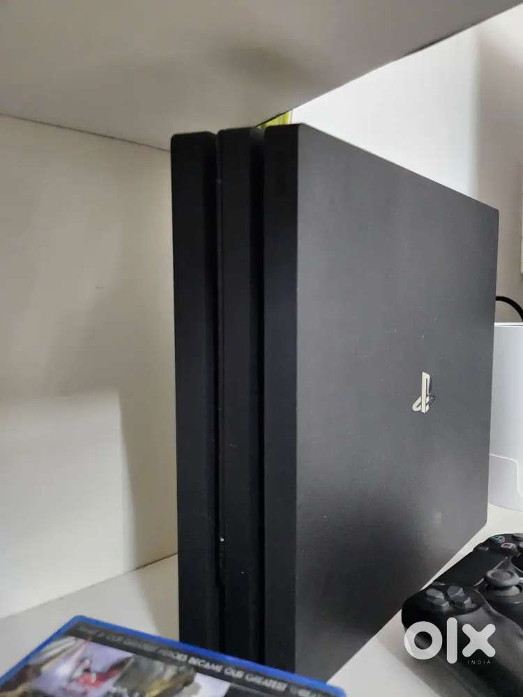 Ps4 pro for sale urgent with games (price can be negotiable)