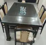 Dining table with 6 chairs at just Rs 10000