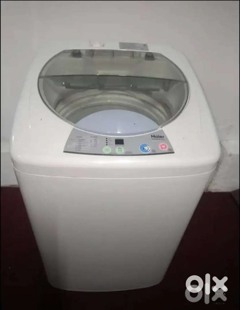 Top load white colour fibre body fully automatic washing machine