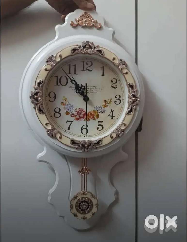 White Wall Clock with Pendulum