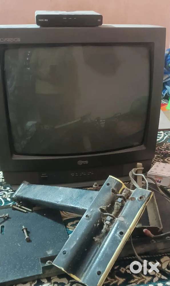 Lg tv+ setup box+ tv stand+ dish