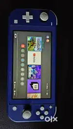 Nintendo Switch Lite Used with 2 game cards and case