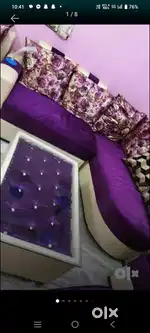 L shape sofa with table .with 2 puffy