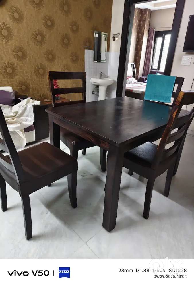 Solid wood dining table for sale . It is in a very condition.