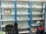 Powder coated racks, billing table and showcase for shop