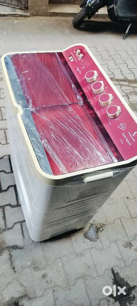 Red colour semi automatic washing machine proper working condition