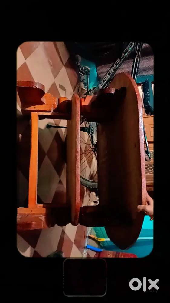A wooden tea table for many use