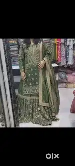 Green farshi lehenga with zardozi work and Off White gown