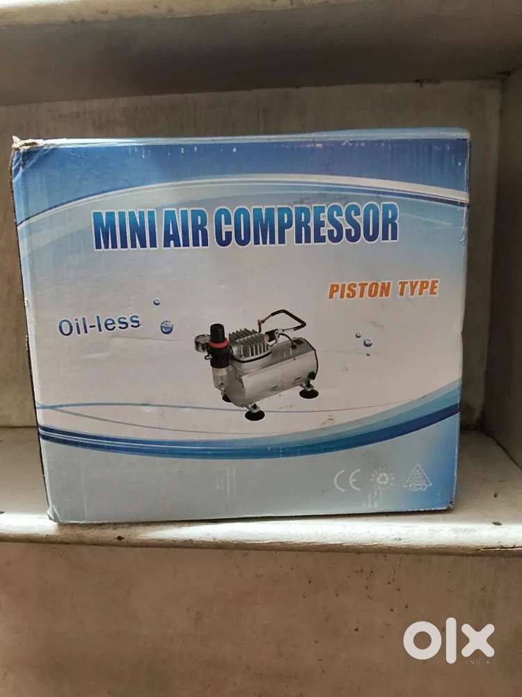 Min air compressor oil less piston type