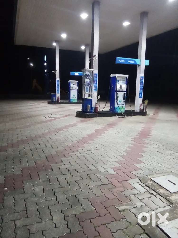 Petrol pump  filling  staff   , male,, fe male