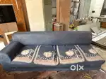 Navy blue colour sofa with 2 puffy