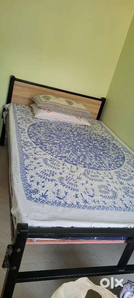 Iron bed with mattress
