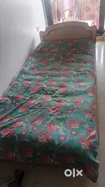 Bed with sliding drawer storage