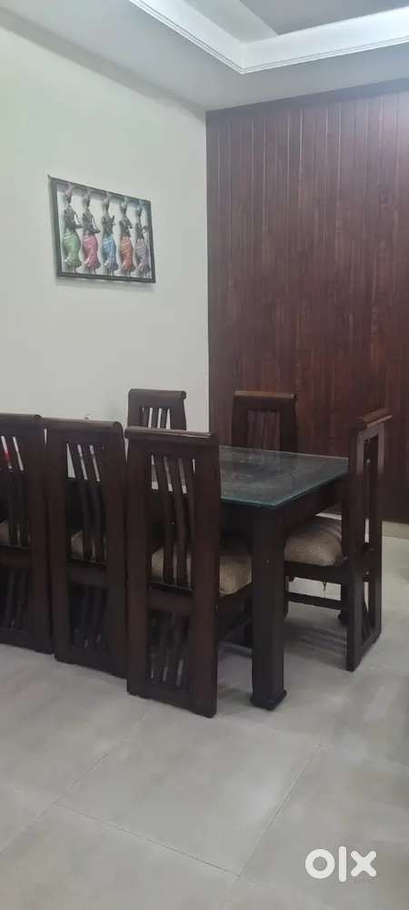 Sagwan dining table with six chairs