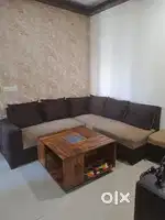 L shape 5 seater sofa multicolour, 2 puffy and table