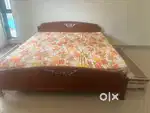 King size bed with attached drawer