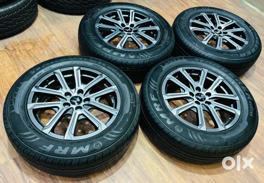 18 inch xuv 700 oem alloys and 235 60 18 MRF TYRES SET OF 4
