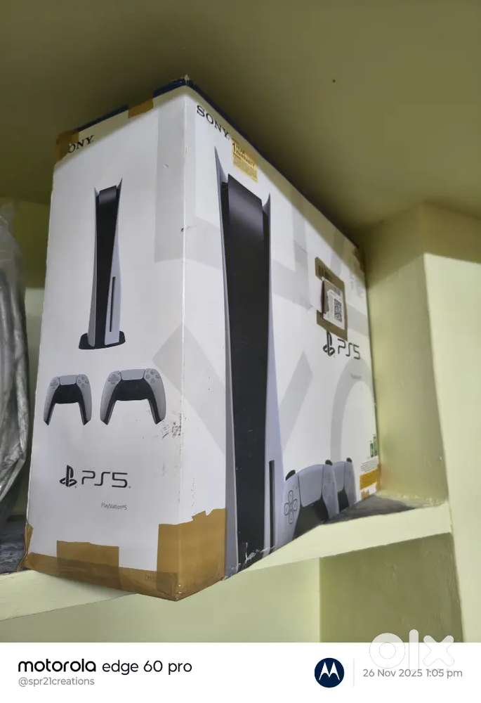 PS5 unboxed with 2 controllers including 5 games